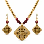 Dokra Art Antique Gold Necklace Set with Maroon Beads and Matching Diamond-Shaped Pendant Earrings for Women